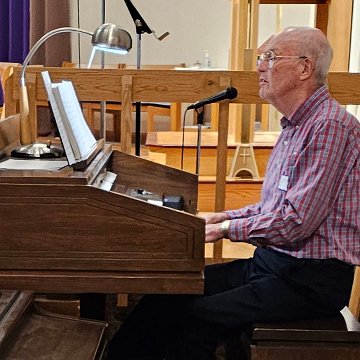 20250322 132507 Sturgis,SD NPM Spring Meeting phtg MCN 7A Lenten~Easter Music Barry Furze, St Francis, Sturgis  blue Gather hymnal CROP4(2x3)